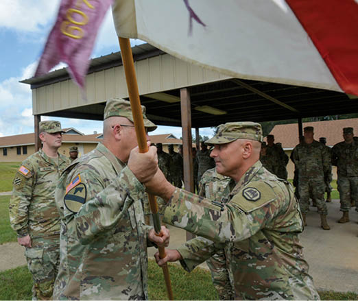 Capt. Coleman Hearne, commander of Headquarters and Headquarters Company, of the 139th Regional Support Group, takes command of the 139th RSG's HHC from Capt. Michael Mayence, outgoing commander of Headquarters and Headquarters Company, of the 139th Regional Support Group, during a change of command ceremony held at Camp Beauregard in Pineville, La., on October 16, 2022. During the ceremony, the guidon is ceremoniously passed from First Sgt. Micki Bryant, Headquarters and Headquarters Company, of the 139th