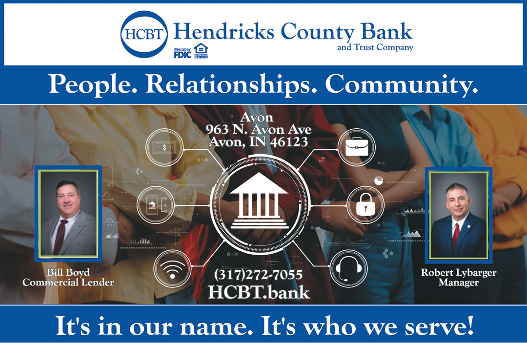 A white sign with black letters that says Hendricks County Bank and Trust Company. Description generated by AI