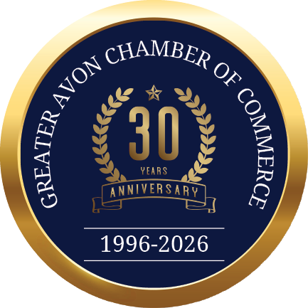 A gold and blue circle with the words “Greater Chamber of Commerce of Avon" written in the center. Description generated by AI
