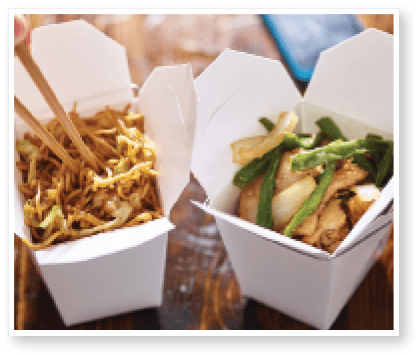 eating lo mein out of chinese take out box wih chopsticks