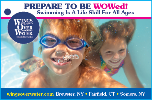 Two children are swimming in a pool, both wearing goggles. AI generated content