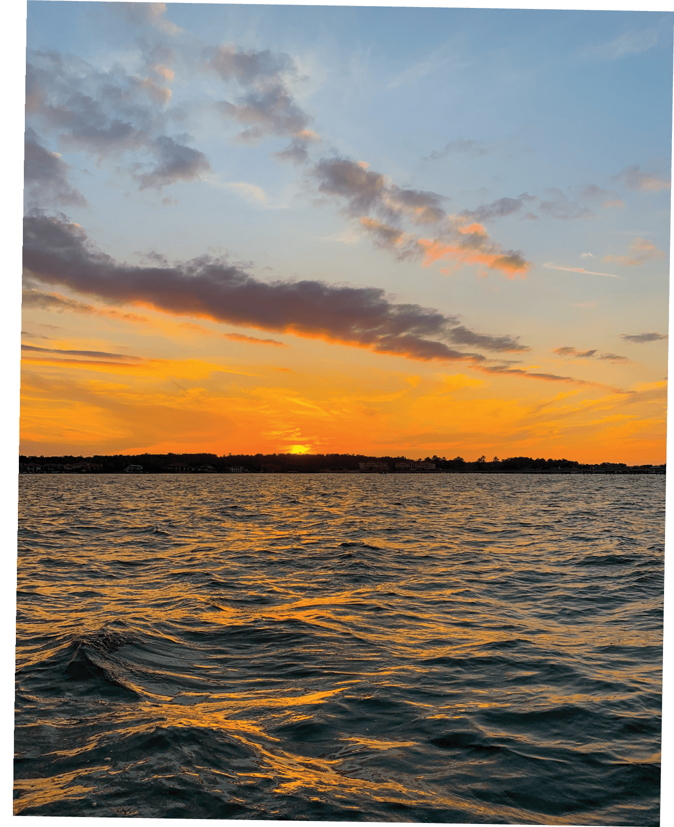 Lake Conroe's colorful sunset on the water