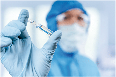 Medical doctor or laborant holding tube with nCoV Coronavirus vaccine for 2019-nCoV virus  Novel Coronavirus originating in Wuhan, China  Coronavirus 2019-nCoV concept 