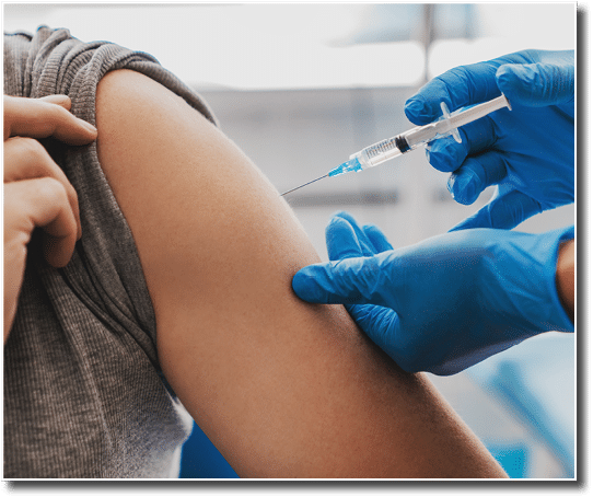 Vaccination of senior person in hospital