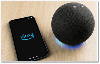 Alexa, Smart speaker and virtual assistant from Amazon company connected to smartphone app  Wooden background  Rio de Janeiro, RJ, Brazil  September 2021 