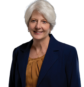 A woman wearing a blue jacket and a gold necklace. AI generated content