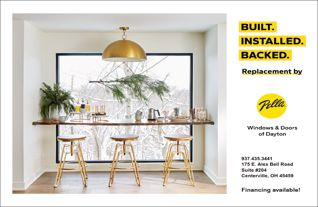 A large dining table with a gold chandelier above it. AI generated content
