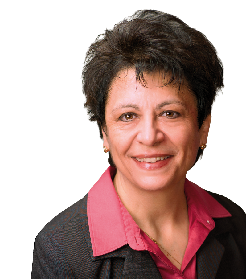 A woman wearing a red shirt and a black jacket is smiling for the camera. AI generated content