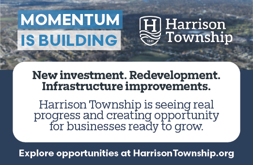 A blue and white sign that says “Momentum is building". AI generated content