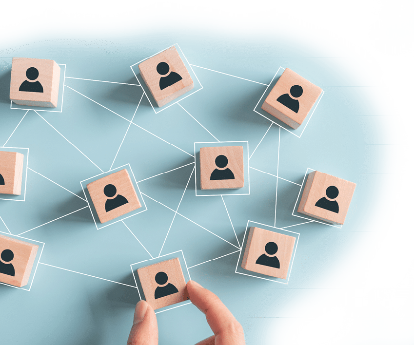 Building a strong team, Wooden blocks with people icon on pink background, Human resources and management concept 