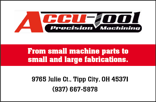 A red and white sign that says “Accu-Tool Professional Machining". Description generated by AI