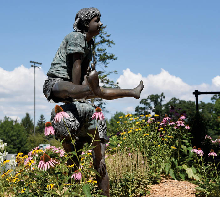 Paul Valade/pvalade@dailyherald.com Statues in Deerfield's Jewett Park.