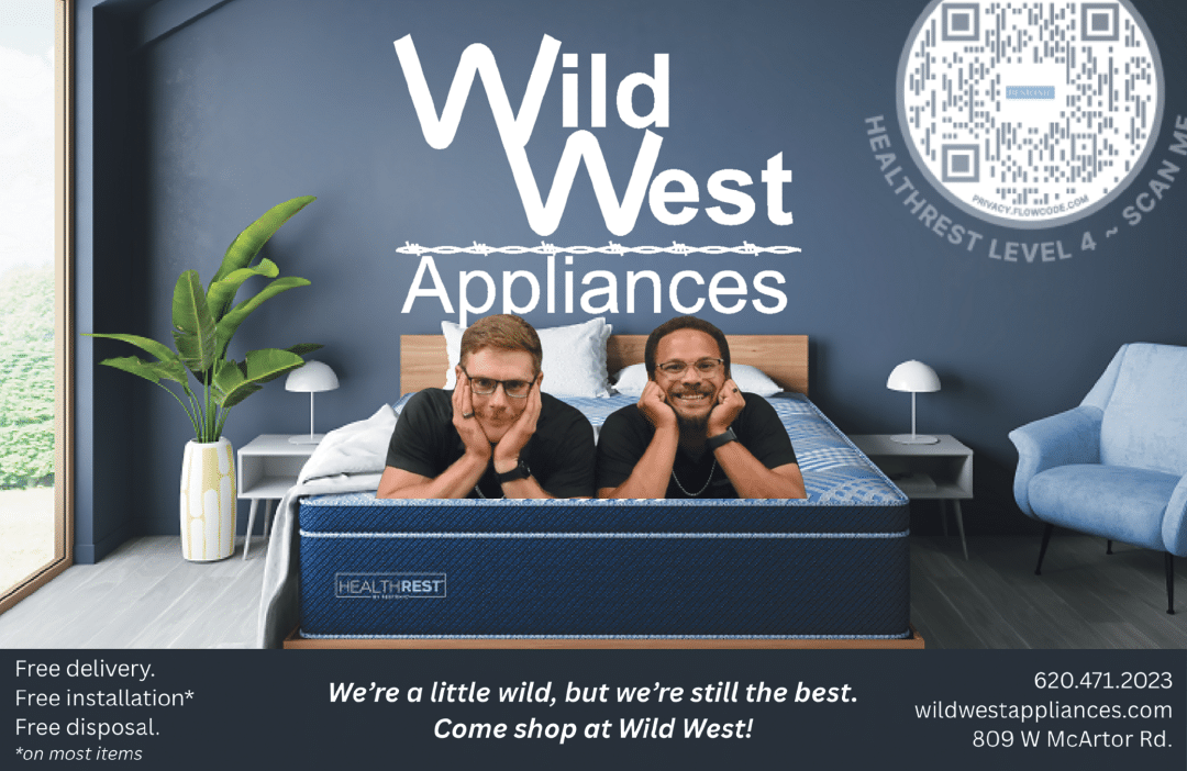 Two men are lying on a bed in a room with a blue wall. They are wearing black shirts and glasses. There is a potted plant on a table next to the bed. AI generated content