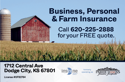 A red barn with a silo in the background. A sign in front of the barn advertises business, personal, and farm insurance. AI generated content
