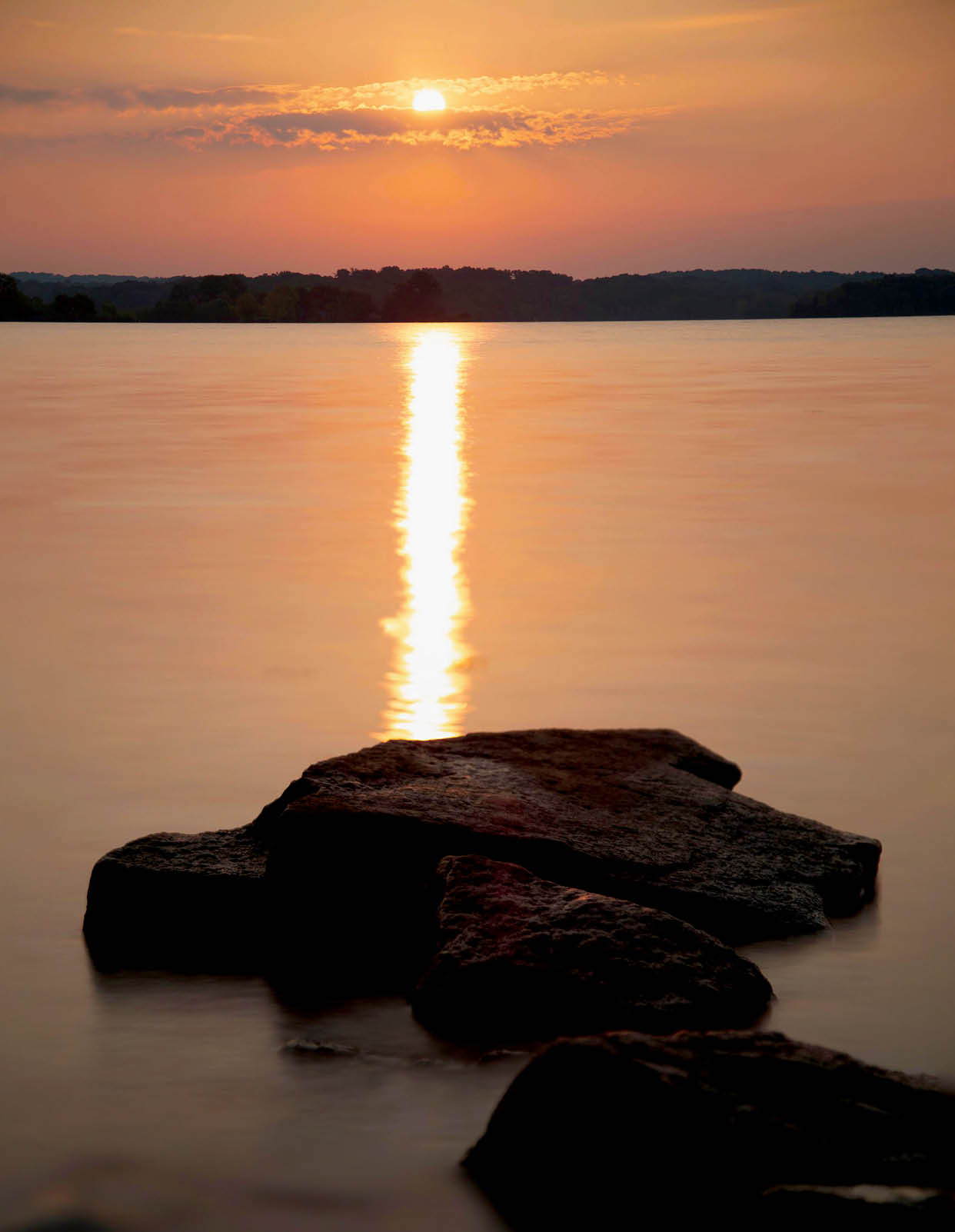 A mesmerizing view of the J. Percy Priest Lake at scenic sunset