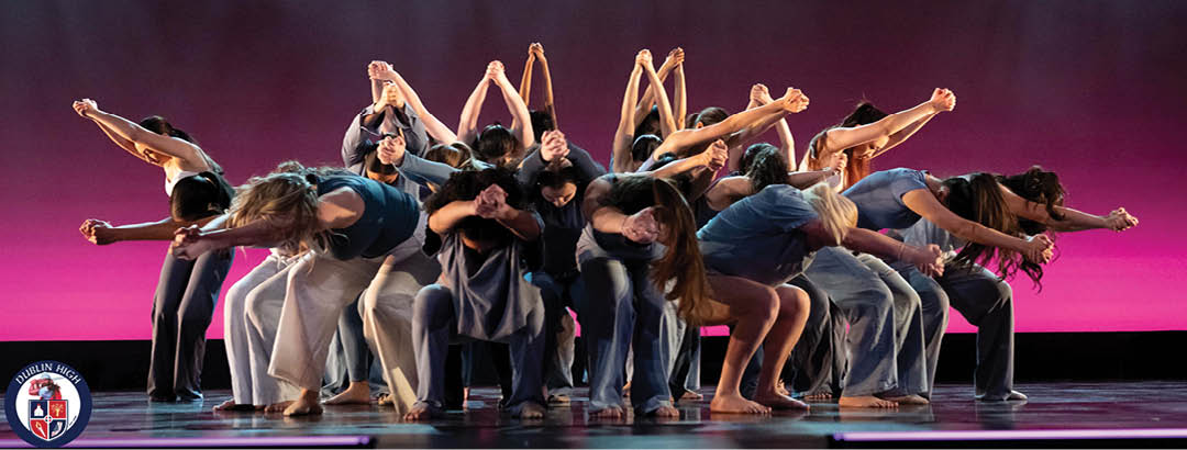 A group of people are performing a dance on stage, with some of them bending over. AI generated content