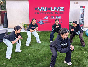 Four women are posing in front of a red banner. AI generated content