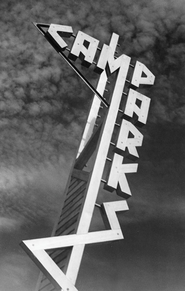 A sign for Camp Parks is shown in a black and white photo. AI generated content