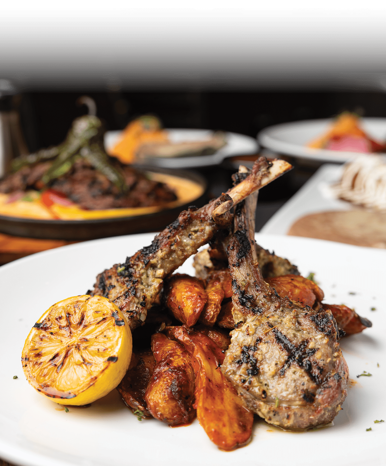 A plate of food with meat and vegetables, including carrots and potatoes, is on a table. AI generated content