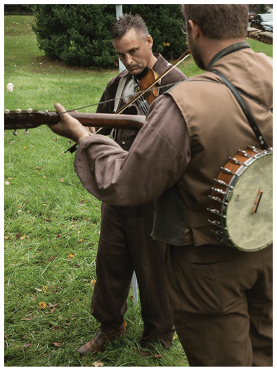 Warrenton, Virginia, USA-October 1, 2016: Musicians in historical costume playing instruments at the Warrenton-Fauquier Heritage Day in Warrenton, Virginia. 