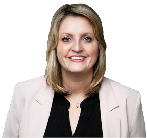 A woman wearing a pink jacket and black shirt. Description generated by AI