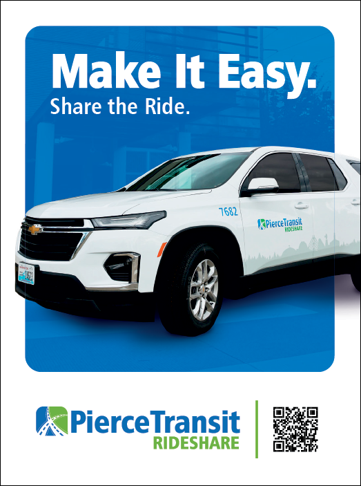A white Chevrolet truck is parked in front of a building. Description generated by AI