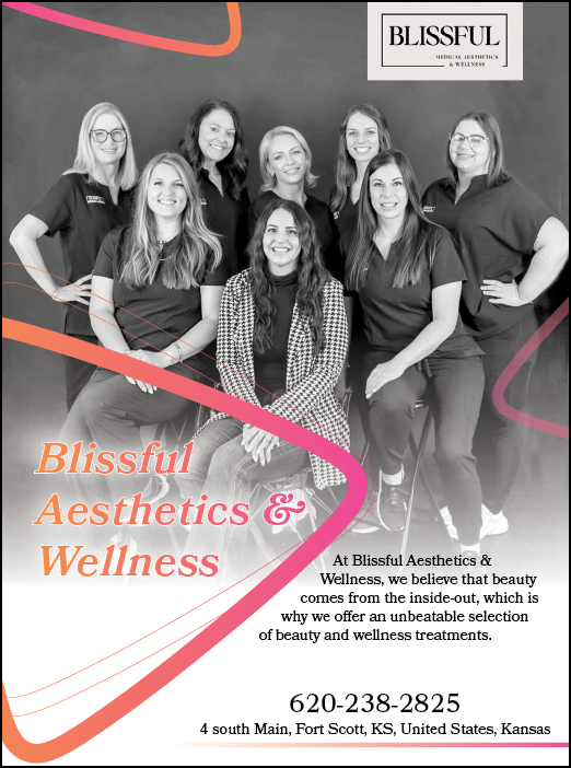A group of women pose for a photo in front of a sign that says “blissful aesthetics & wellness". AI generated content