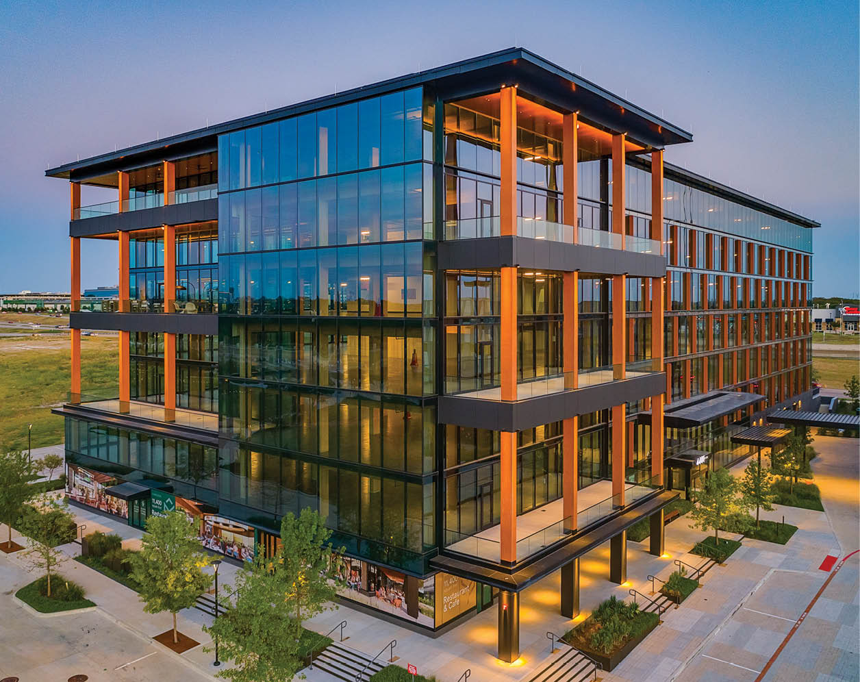 A large building with many windows and a glass front. AI generated content