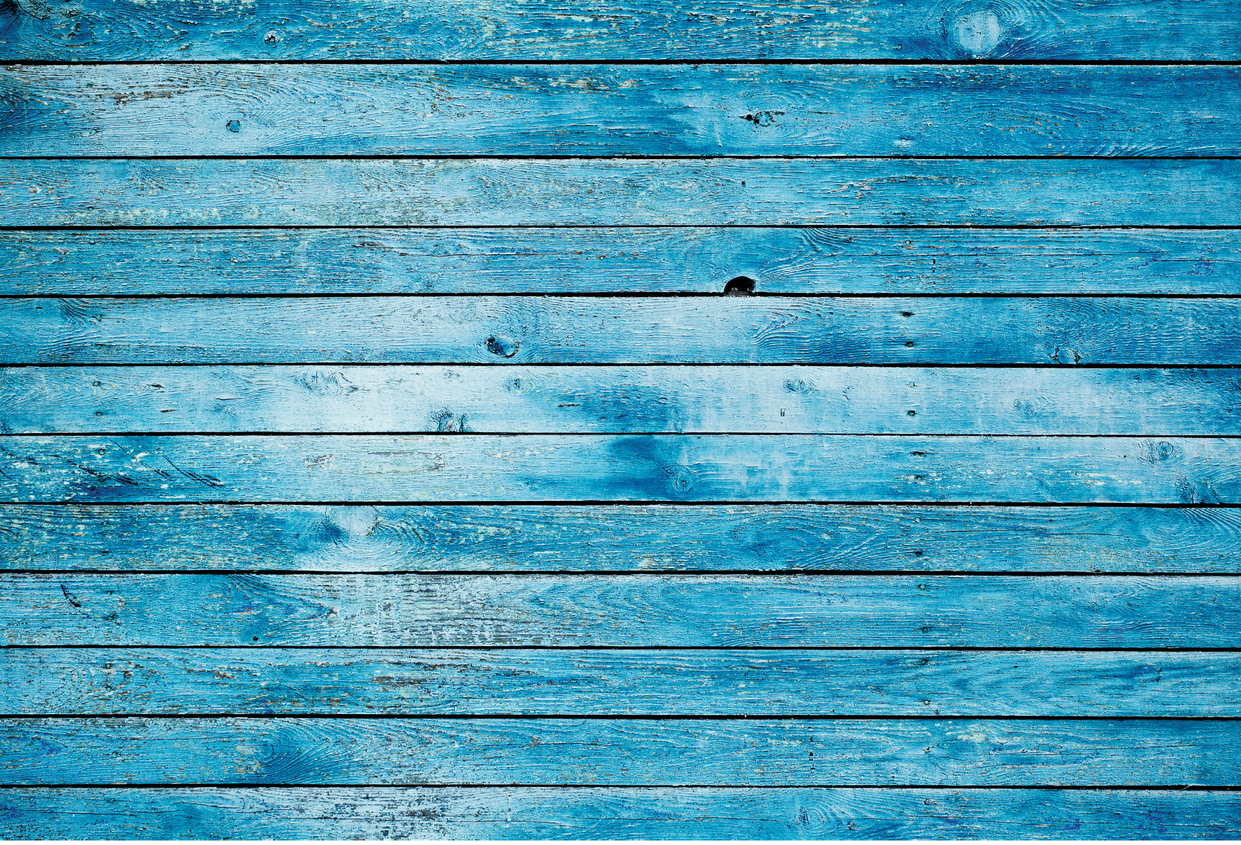 Old blue dirty wooden wall. High quality image, great for backgrounds and modern grunge designs.