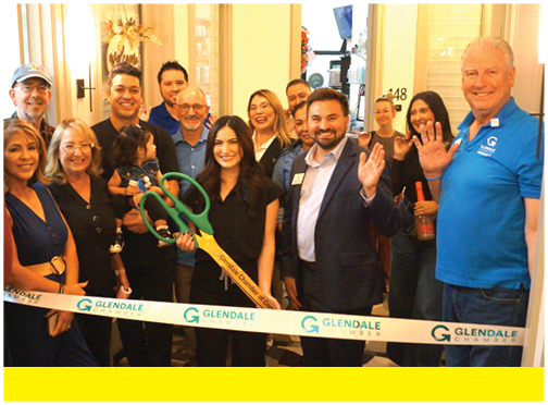 A group of people are standing in front of a ribbon, posing for a picture. AI generated content