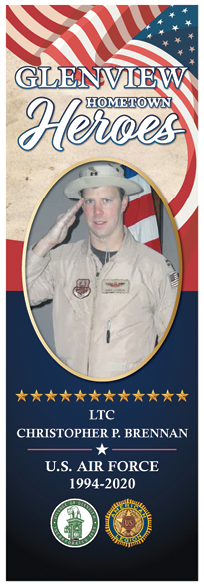 A man in a military uniform is pictured on a blue and red poster. Description generated by AI