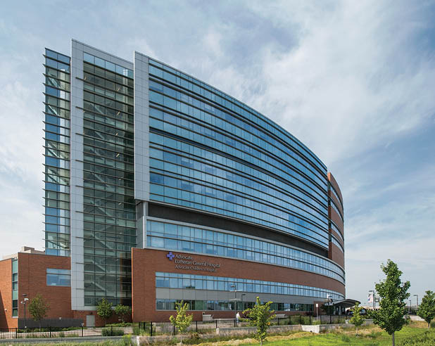 A large building with many windows. Description generated by AI