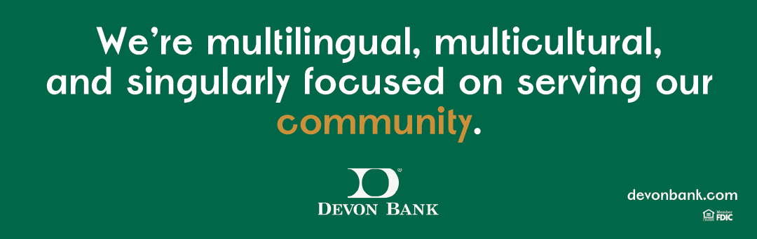 A green and yellow sign that says “We're multicultural and singularly focused on serving our community." Description generated by AI