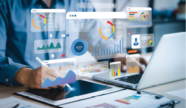An analyst uses a computer and dashboard for data business analysis and Data Management System with KPI and metrics connected to the database for technology finance, operations, sales, marketing