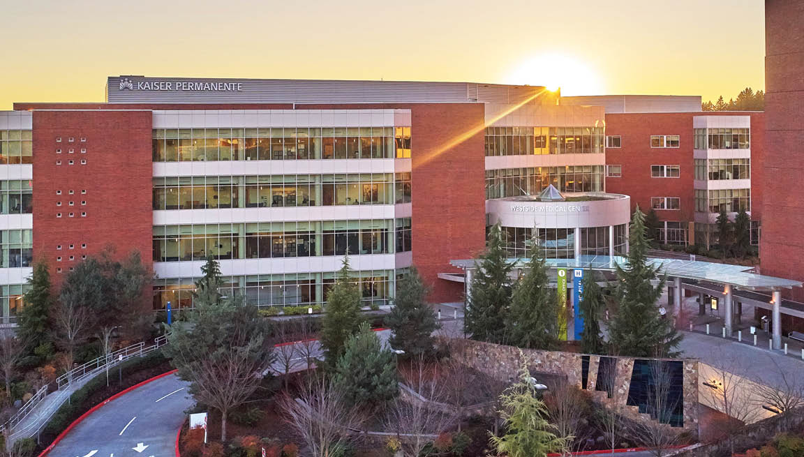 A large building with a sun shining on it. Description generated by AI
