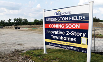 Work taking place at the Kensington Fields townhome site, for the Hoffman Estates town guide.