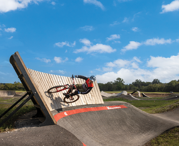 A skateboarder is performing a trick on a ramp. AI generated content