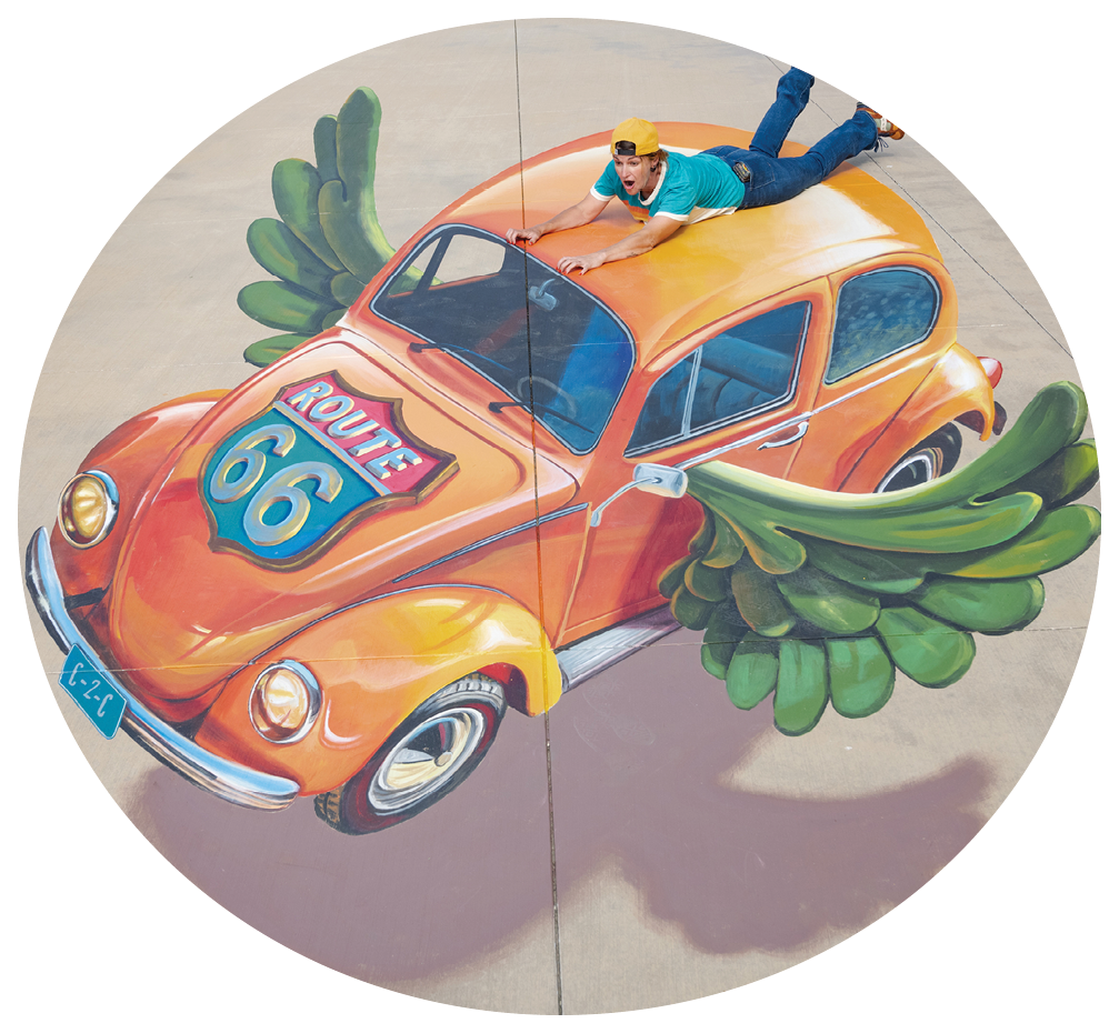 A man is lying on a sidewalk with a painted car on top of him. AI generated content