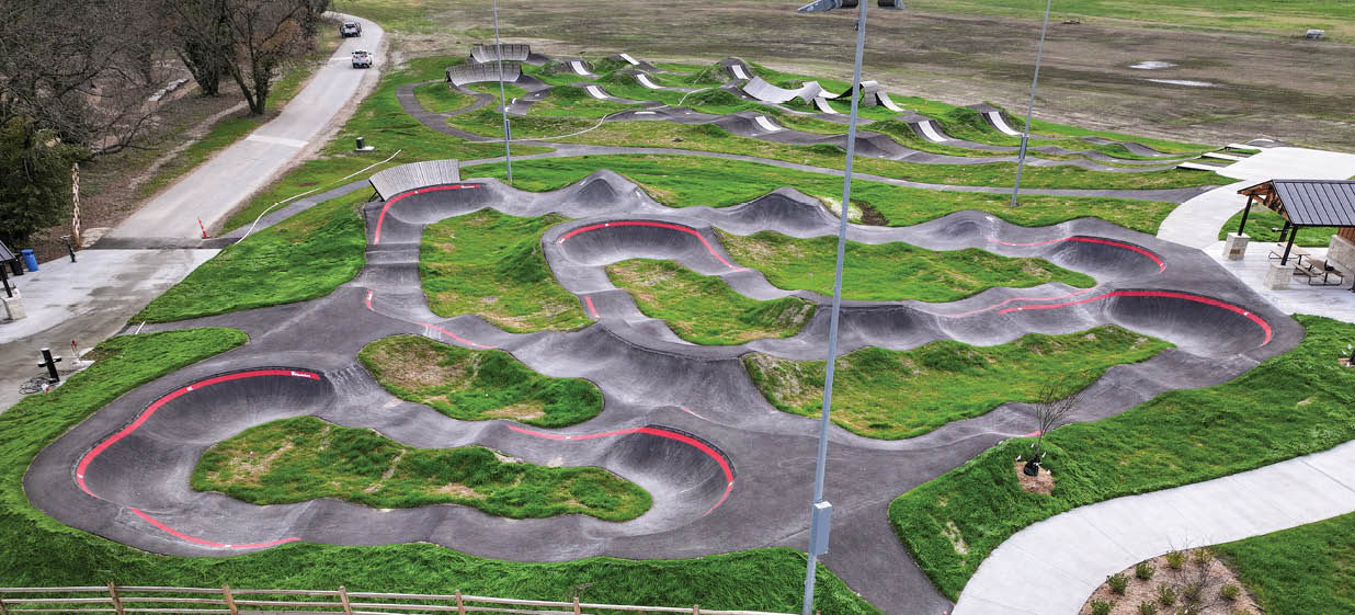A skate park with a variety of ramps and obstacles. AI generated content