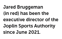 Jared Bruggeman (in red) has been the executive director of the Joplin Sports Authority since June 2021.