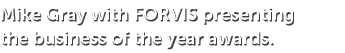 Mike Gray with FORVIS presenting the business of the year awards.
