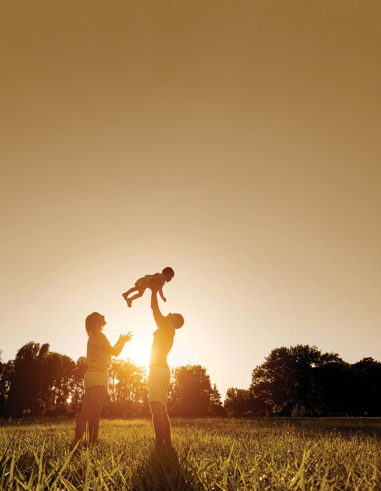 A woman is holding a child in a field of grass. AI generated content