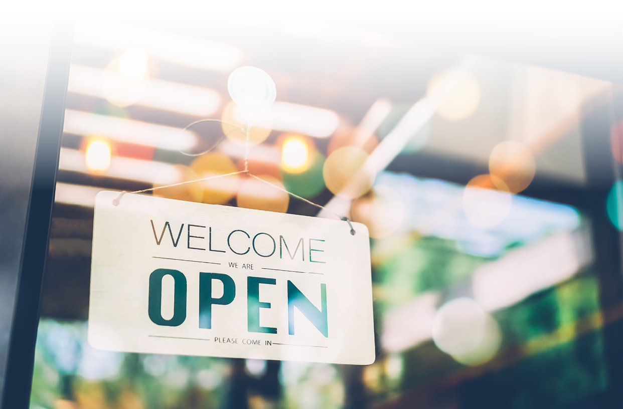 A sign that reads “welcome open" hangs in front of a window. AI generated content