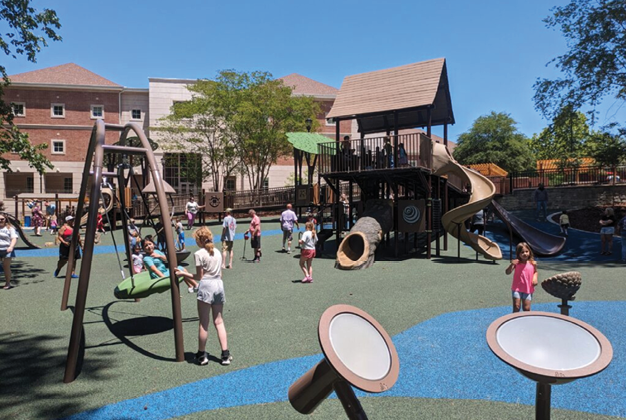 A playground with a slide and a swing. Description generated by AI
