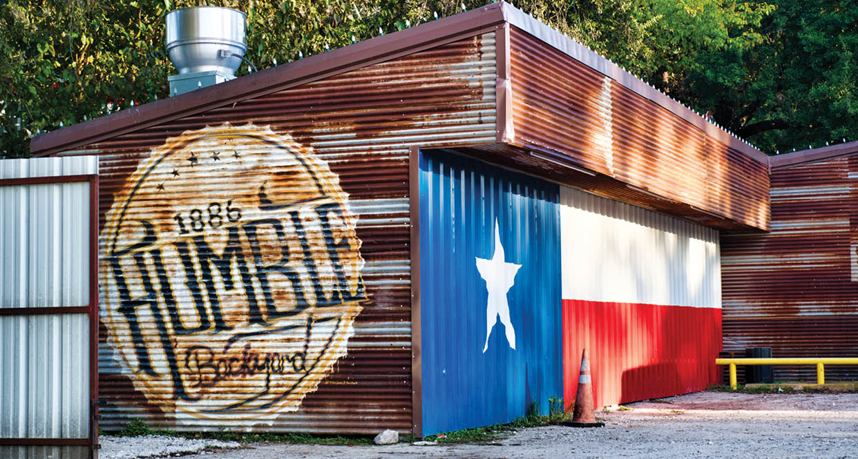 Humble, Texas/USA 11/06/2019: 1886 Humble Backyard exterior. This rustic bar and lounge is over 50 years old and serves alcohol, food and live music with an atmosphere reflecting Humble, Texas.