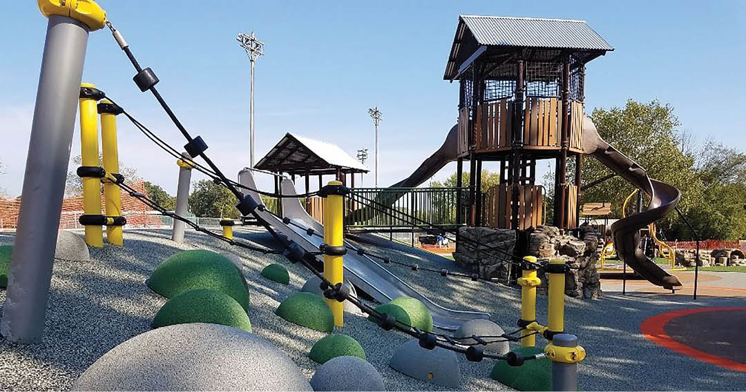 A playground with a slide, swings, and a climbing structure. Description generated by AI