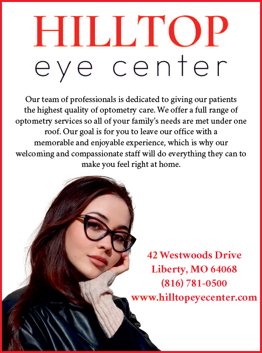 A woman wearing glasses and a black jacket. Description generated by AI