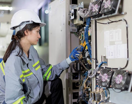 electricity engineer female working check service high voltage electrical cabinet. worker repair electric surge problem problem in industry factory.