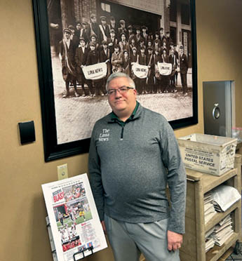 J Swygart | The Lima News David Trinko, the editor of The Lima News, stands in the newspaper's lobby in the Enterprise Building, 205 W. Market St., Lima.