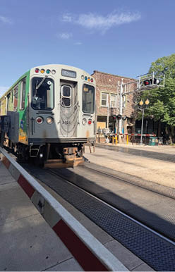 A train is on the tracks. Description generated by AI